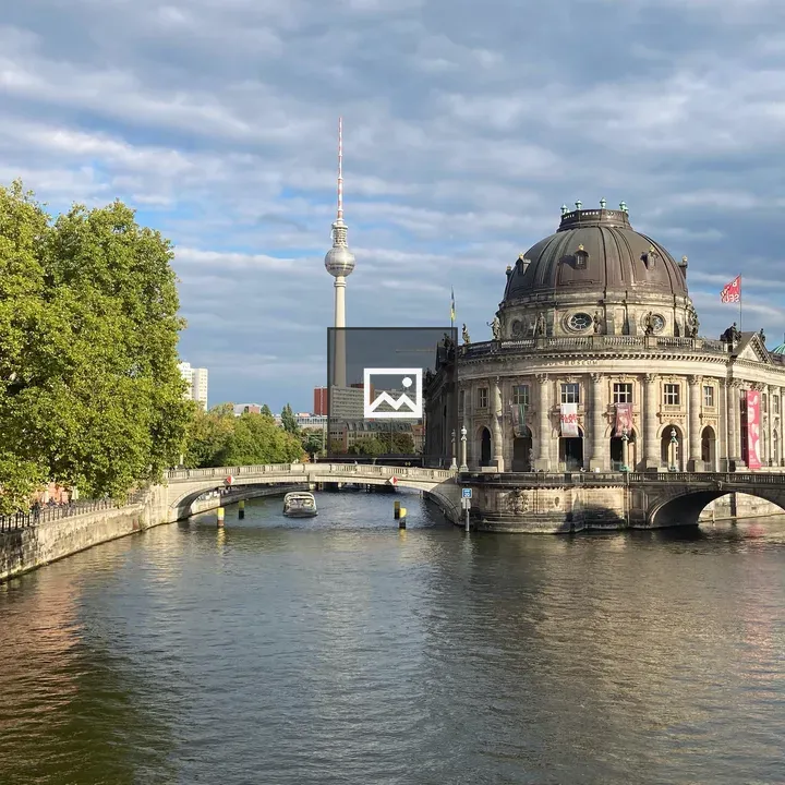 Historic domed building by river