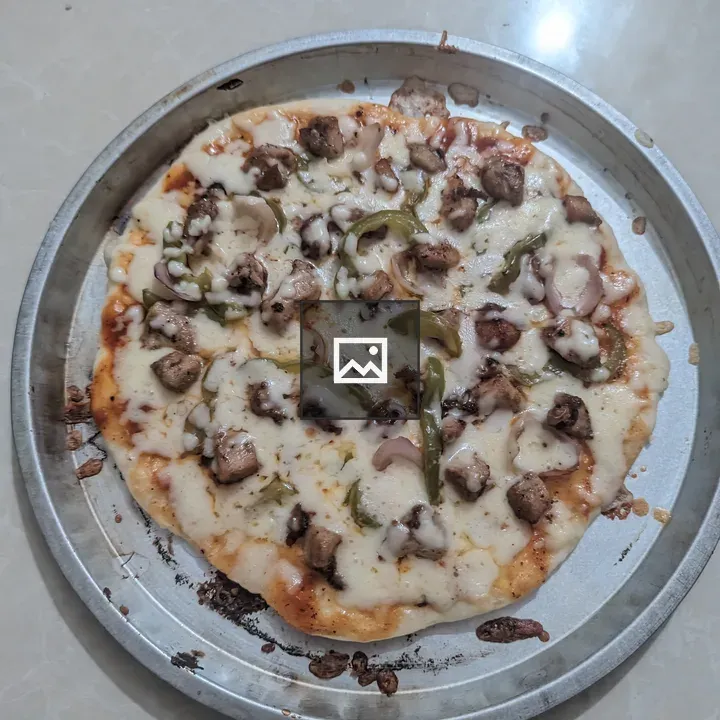 Homemade pizza on tray