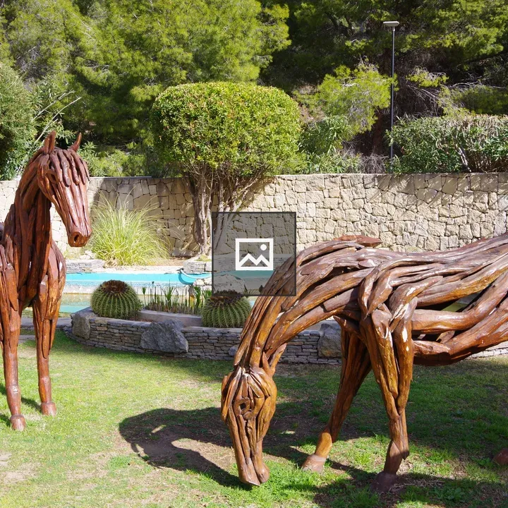 Sculpture of Two Wooden Horses