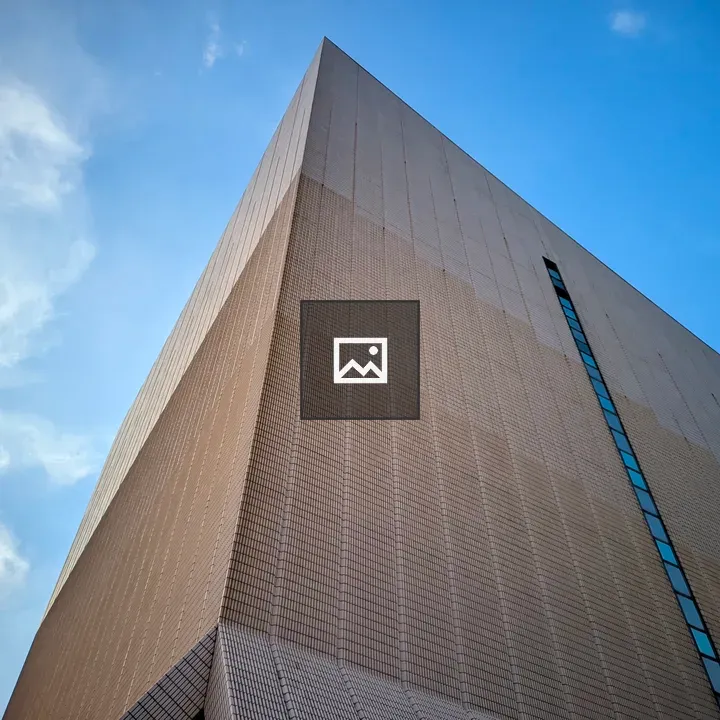 Facade with Sky and Clouds