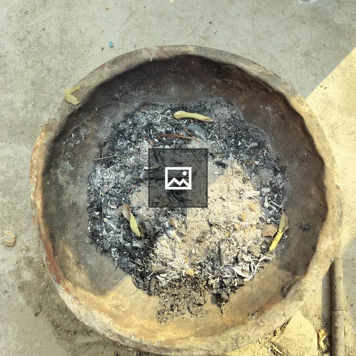 Ashes in a clay fire pit