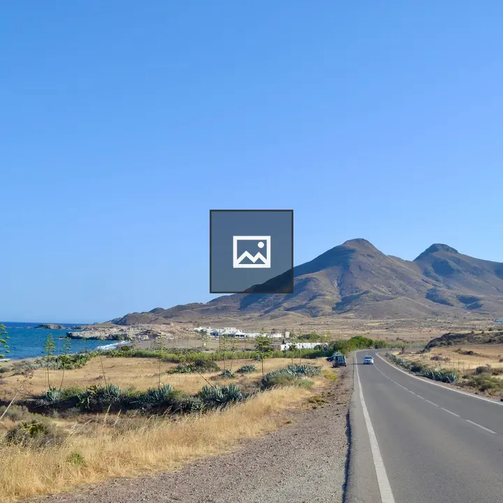Coastal Road Toward Mountains
