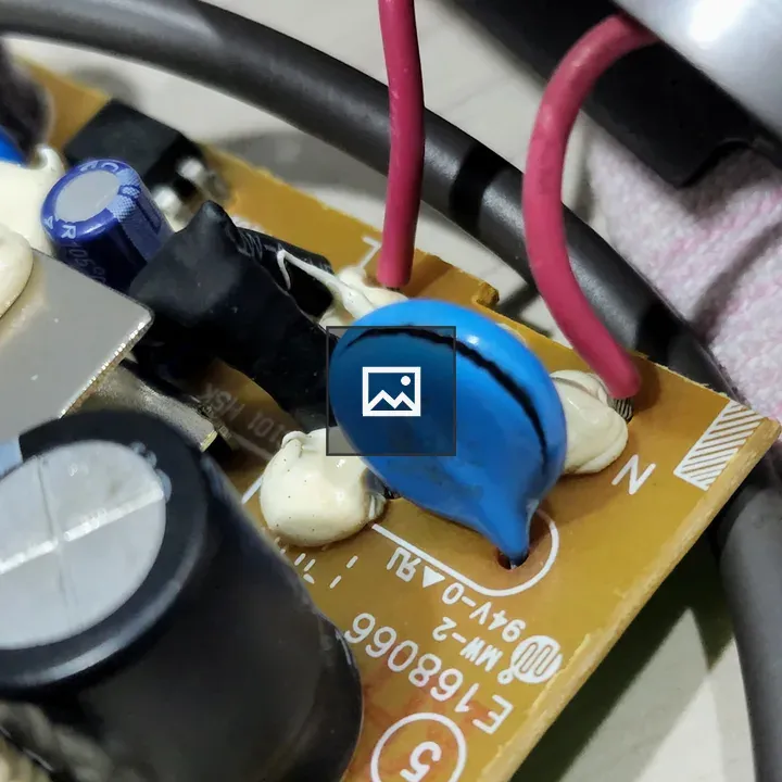 Circuit board with broken capacitor