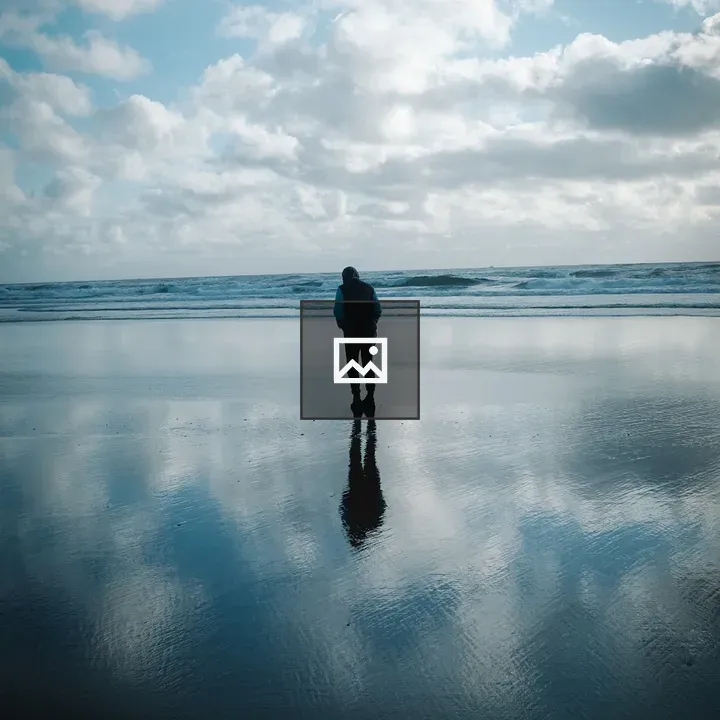 Person at the Beach in Cloud Reflection