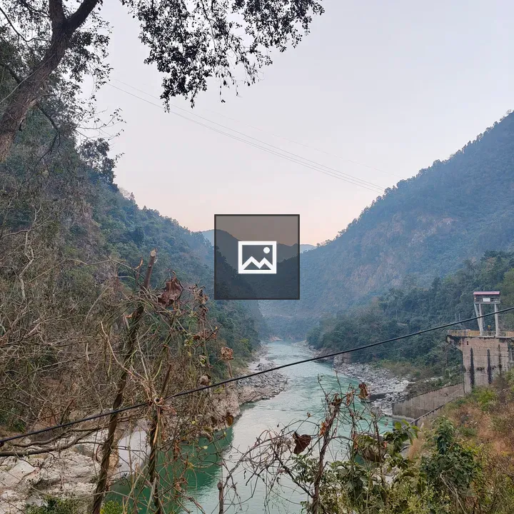 River Through Mountain Valley