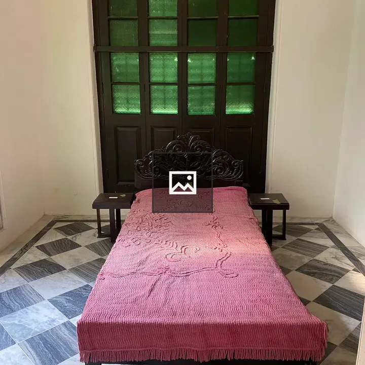 Bedroom with Pink Blanket