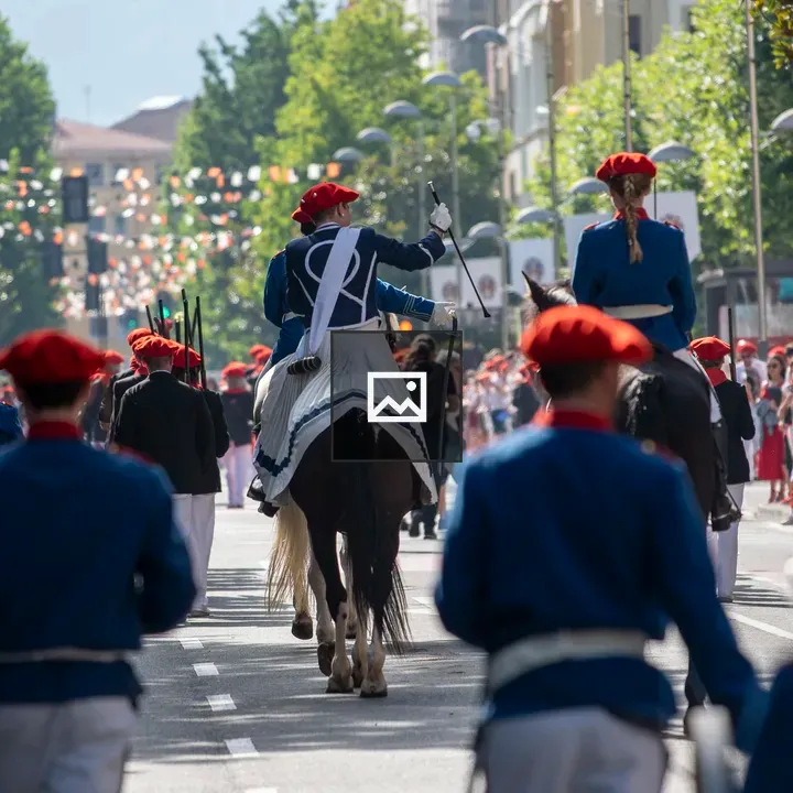 Parade on horseback in Basque attire