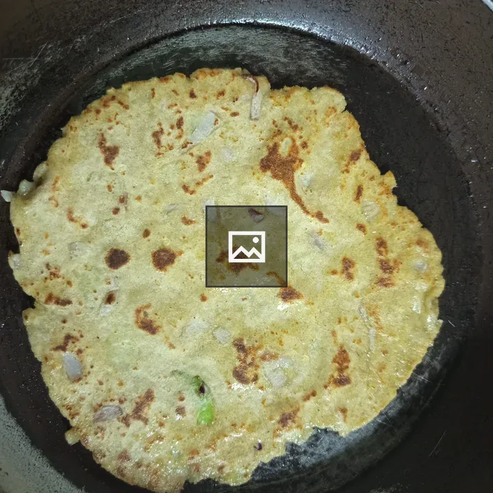 Aloo Paratha Cooking on Pan