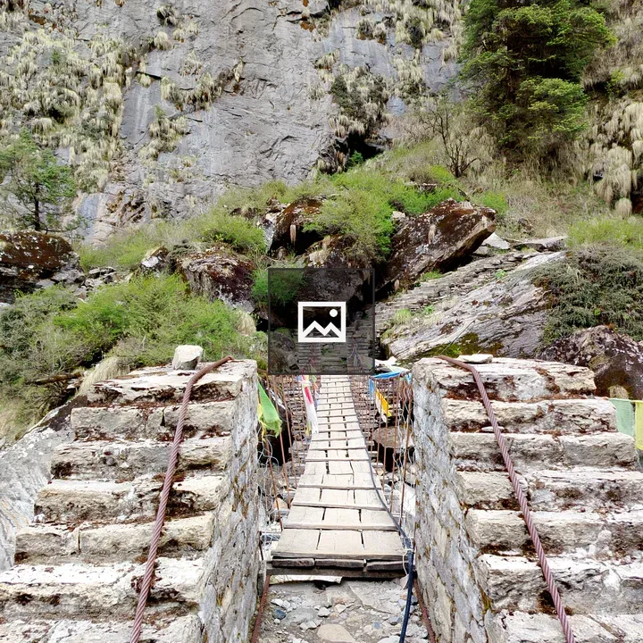 Stone Steps to Bridge with Prayer Flags