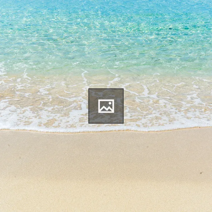 Beach shoreline with clear waters