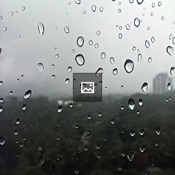 Raindrops on Glass Window