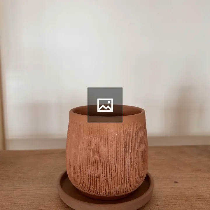Terracotta Pot on Wood Table