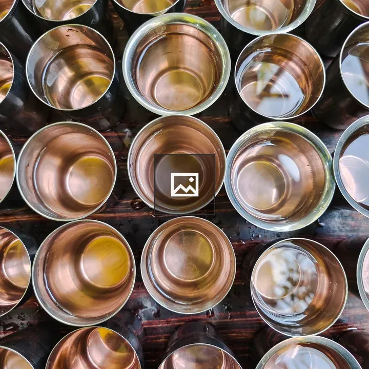 Array of steel glasses with water