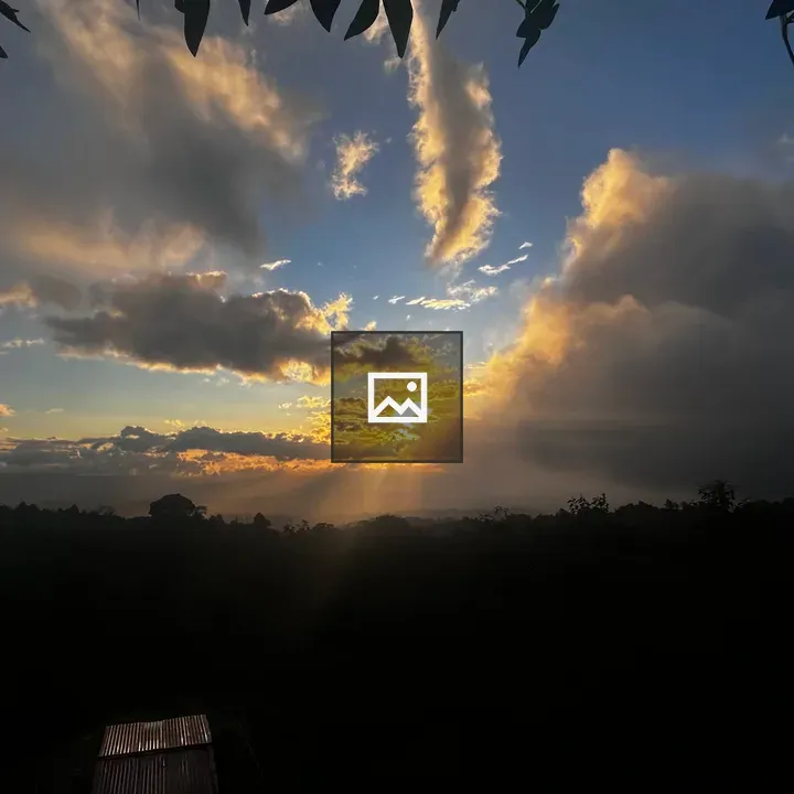 Sunset over a Cloudy Landscape