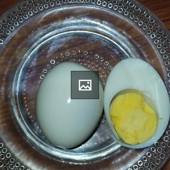 Boiled Egg on Glass Plate