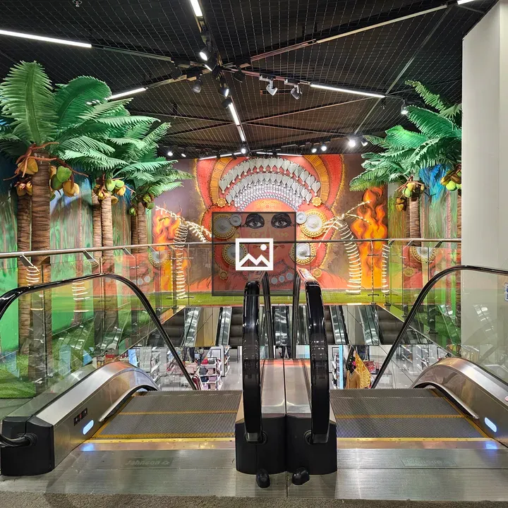 Escalator to mural in Kerala