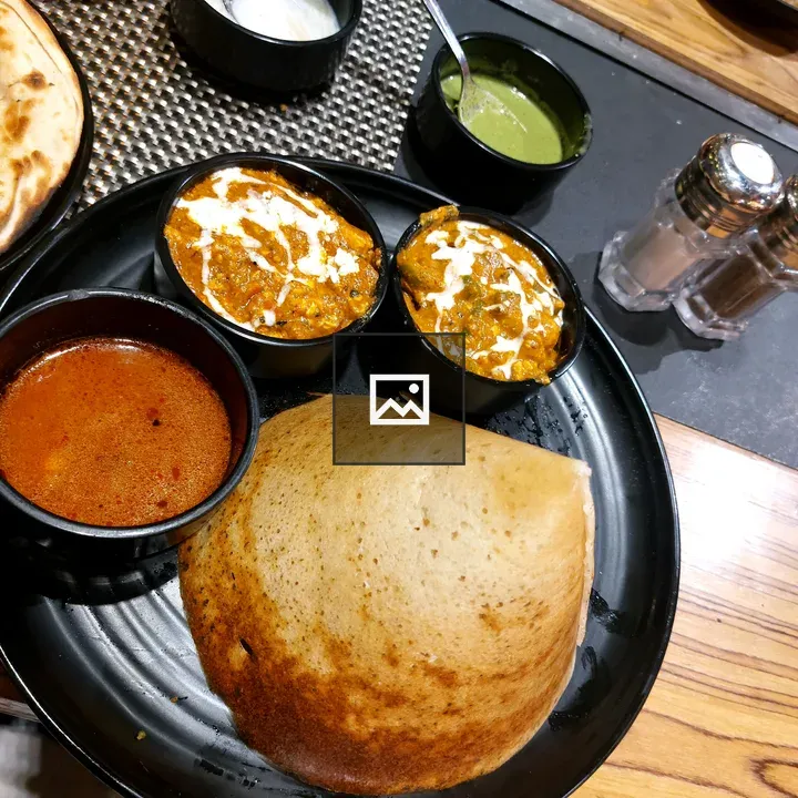 Overhead Indian meal with dosa