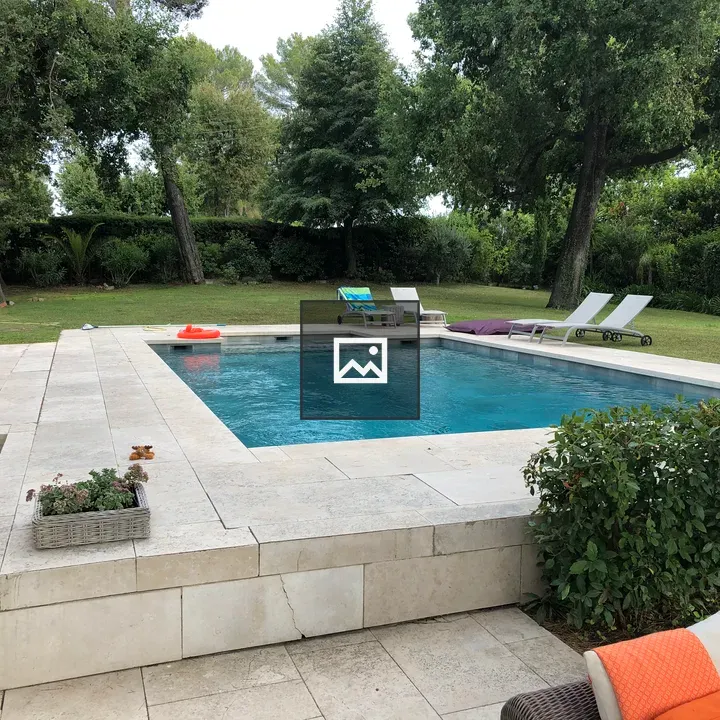 Outdoor pool with greenery