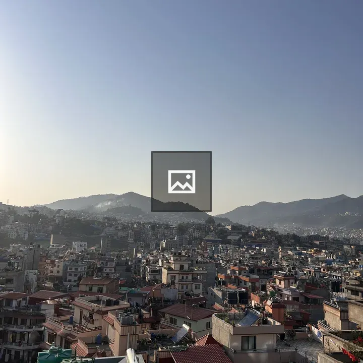 Aerial urban rooftops with tanks and solar