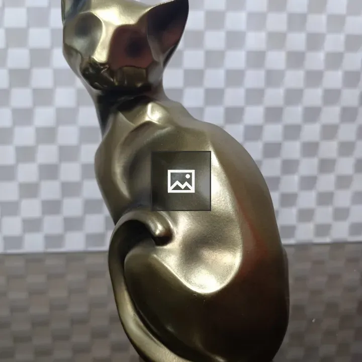 Golden cat sculpture