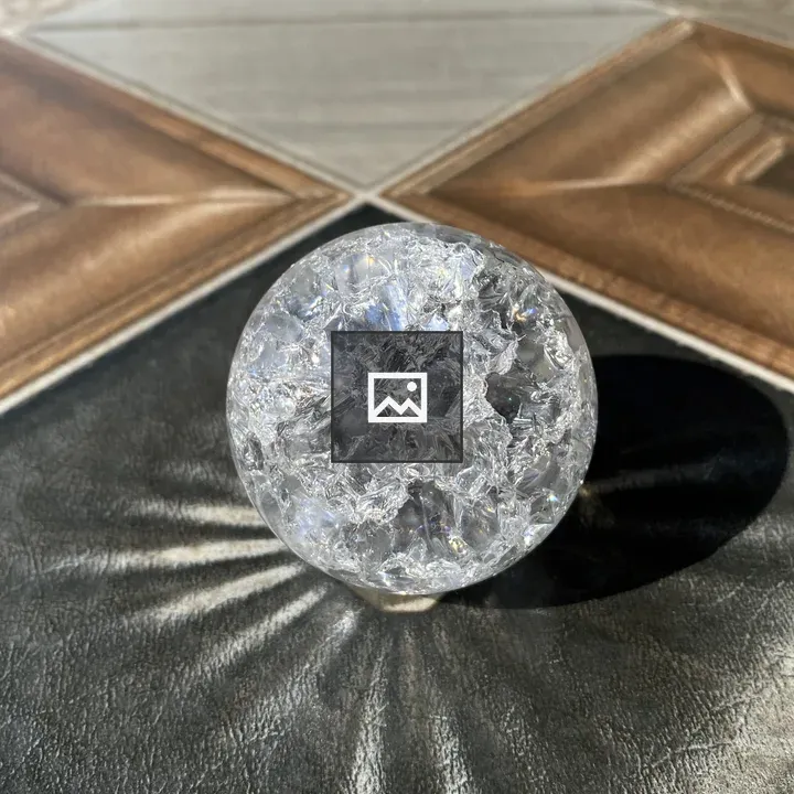 Crystal ball on textured surface