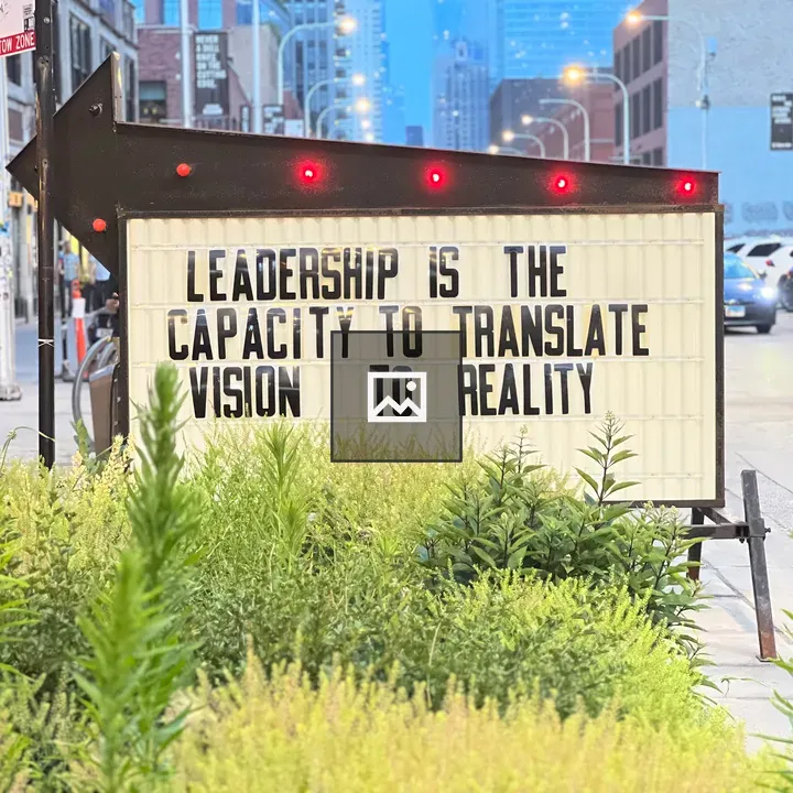 Sidewalk sign with leadership quote