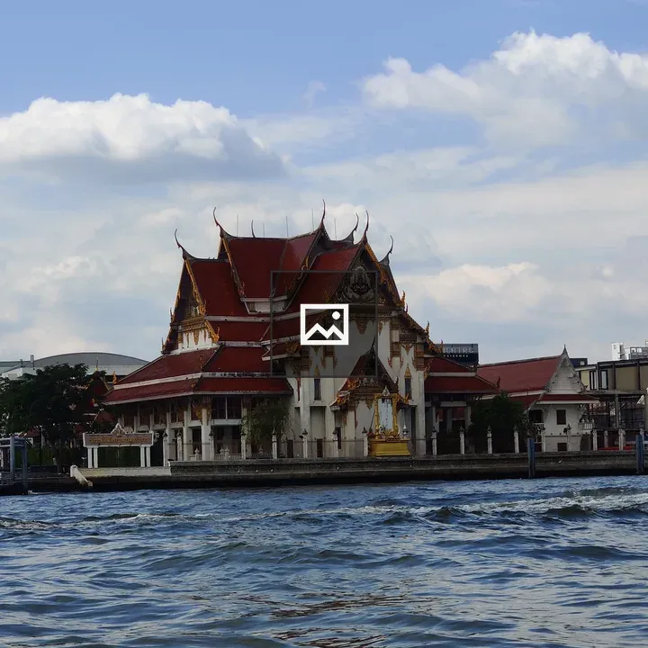 Traditional Thai Building by Water