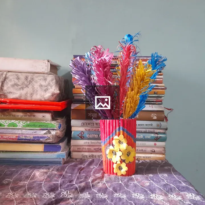 Colorful paper flowers in vase