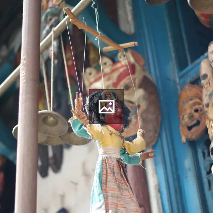 Colorful marionette with masks