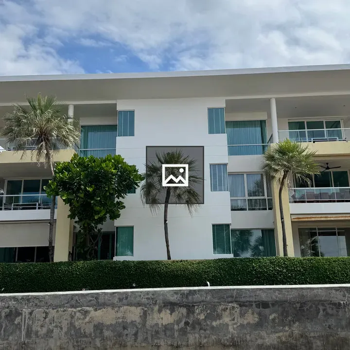 Modern white apartment building with balconies
