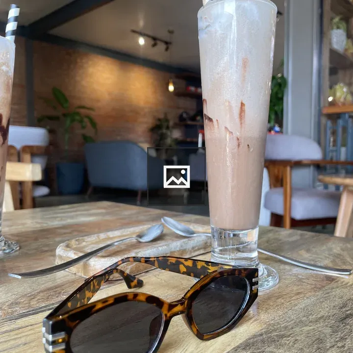 Tortoiseshell Sunglasses on Wood