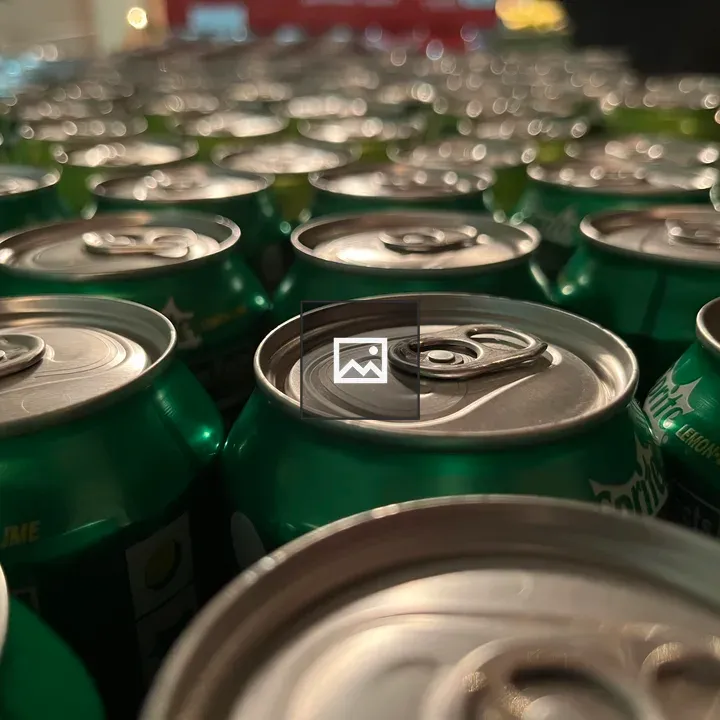 Pop cans on surface