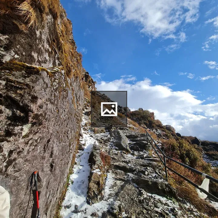 Trekking Trail in Snow and Clouds