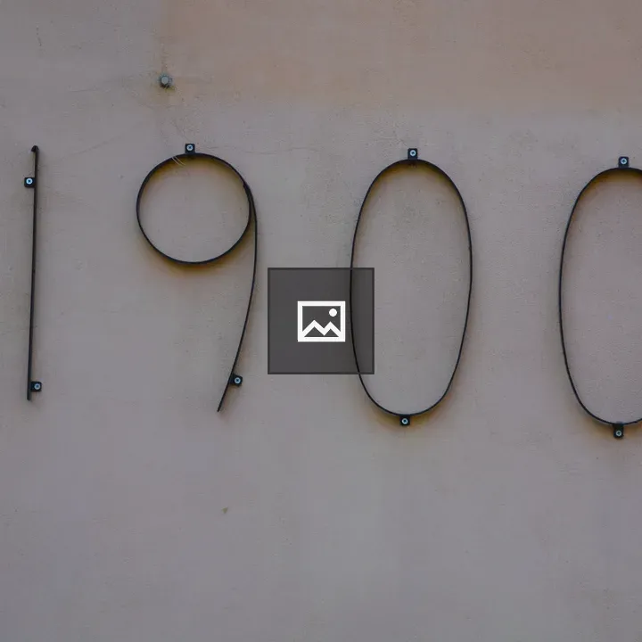 Elegant wrought iron numbers 1900