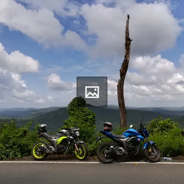 Two Motorcycles in Mountains