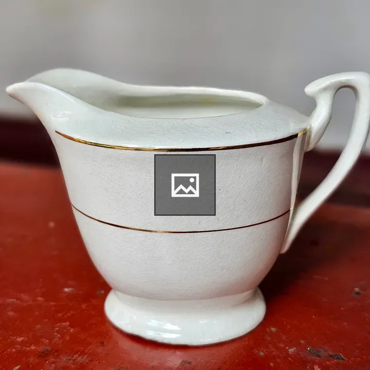 Vintage white milk jug