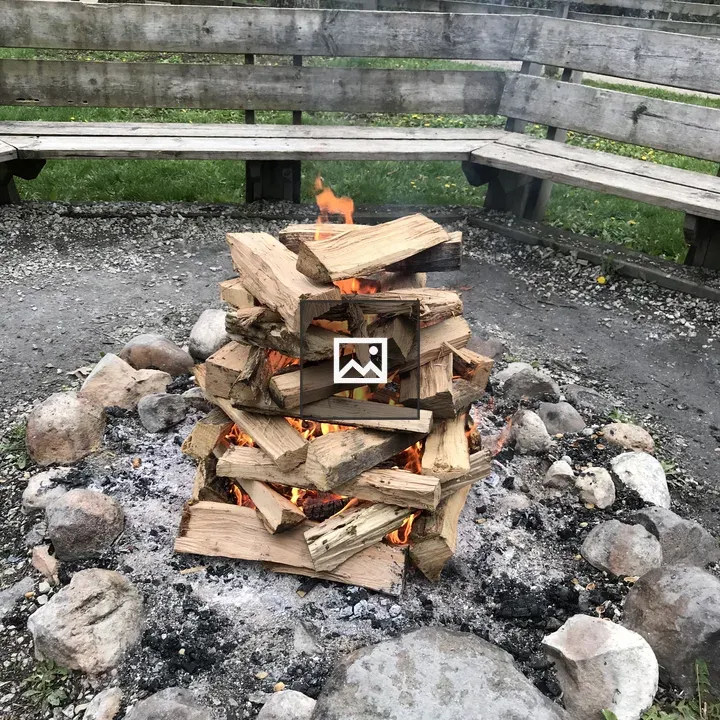 Fire ring with stacked firewood