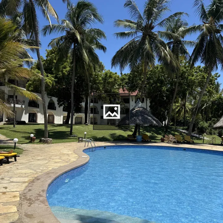 Resort Pool with Palm Trees