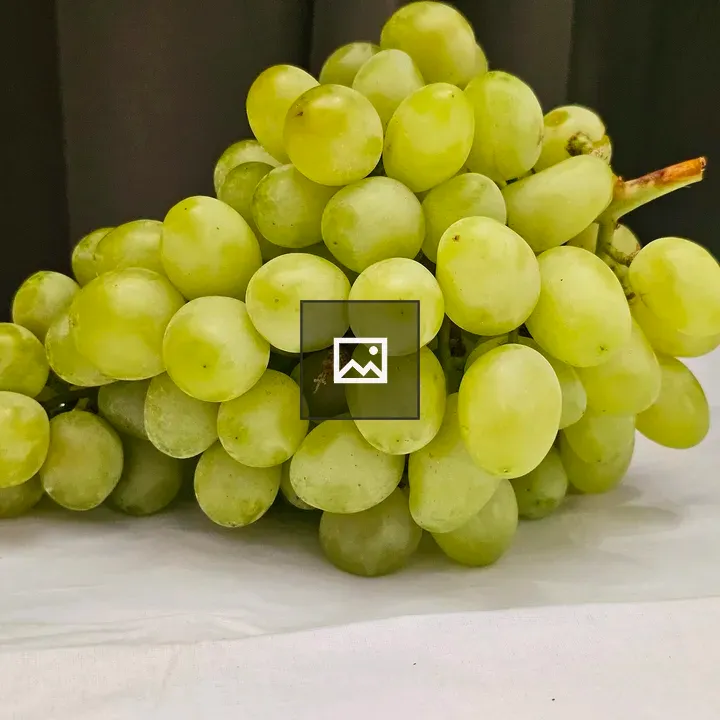 Grapes on White Surface