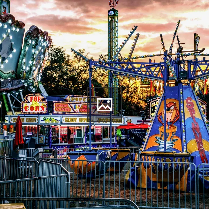 Carnival rides at sunset