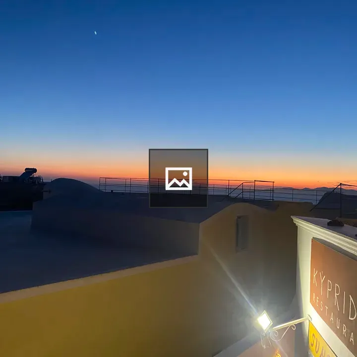 Sunset Over Santorini Harbor