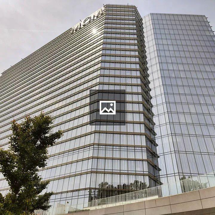 Two tall glass buildings
