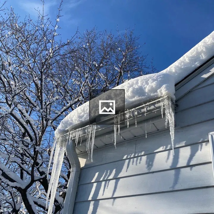 Snow and Icicles on Roof
