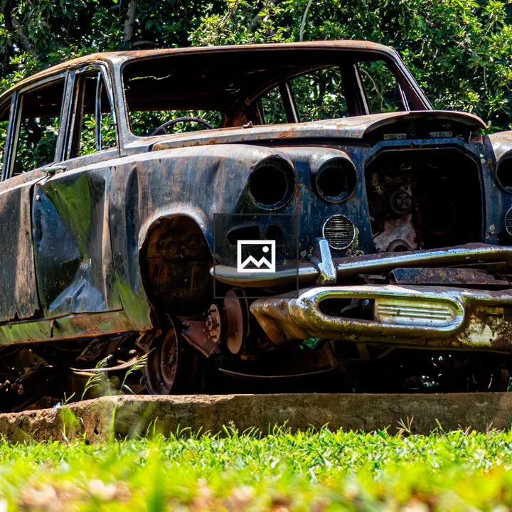Rusting shell of vintage Rolls-Royce