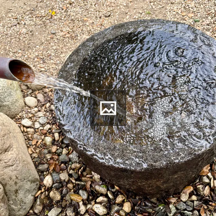 Copper Spout Pouring Water