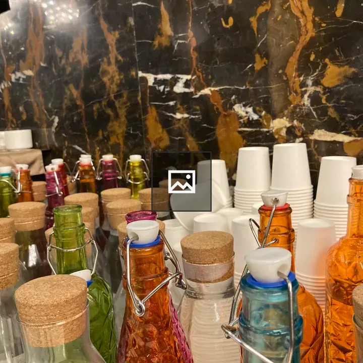 Colorful glass bottles with corks
