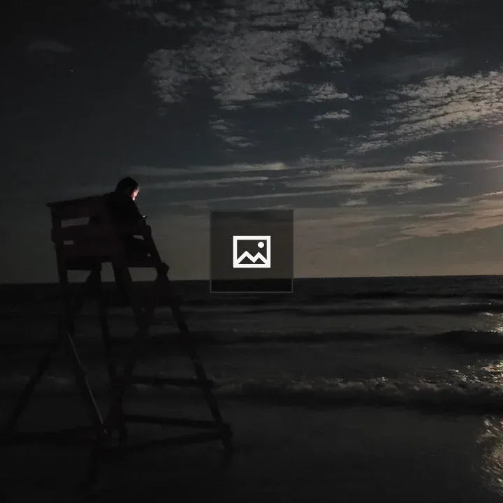 Lifeguard on Moonlit Beach