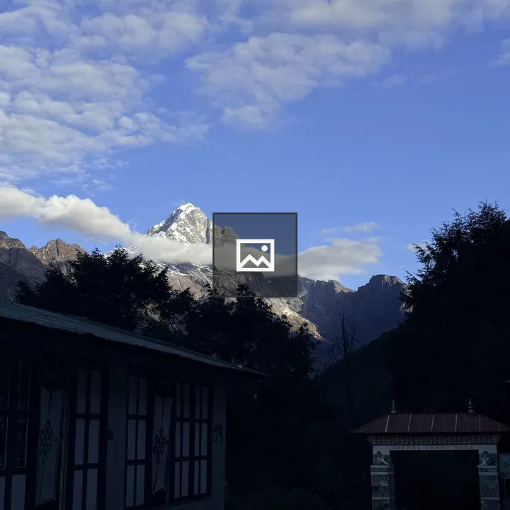 Snow-capped Mountain with Building