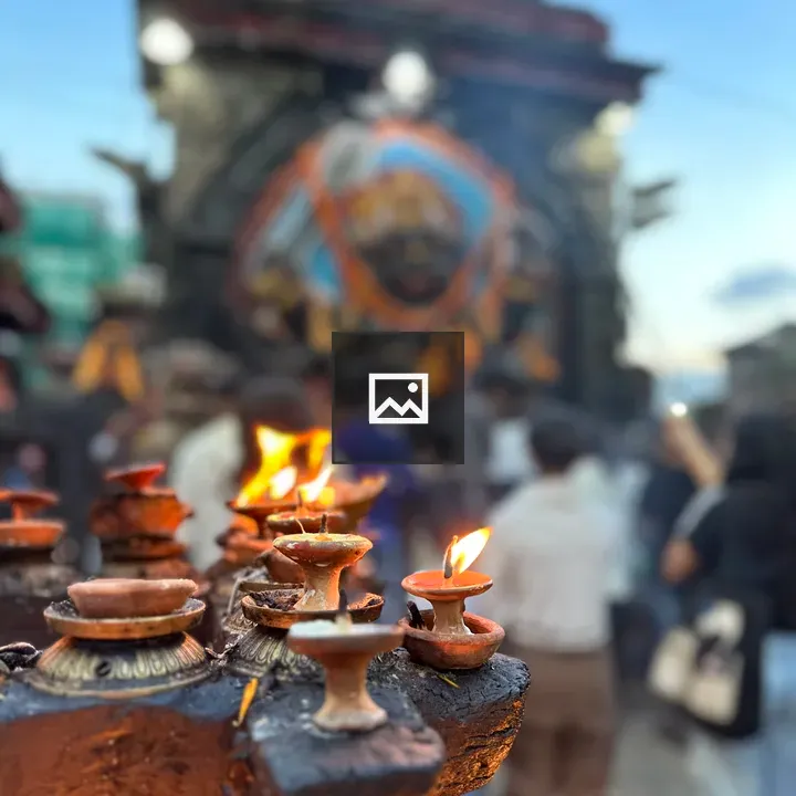 Lights in front of God statue