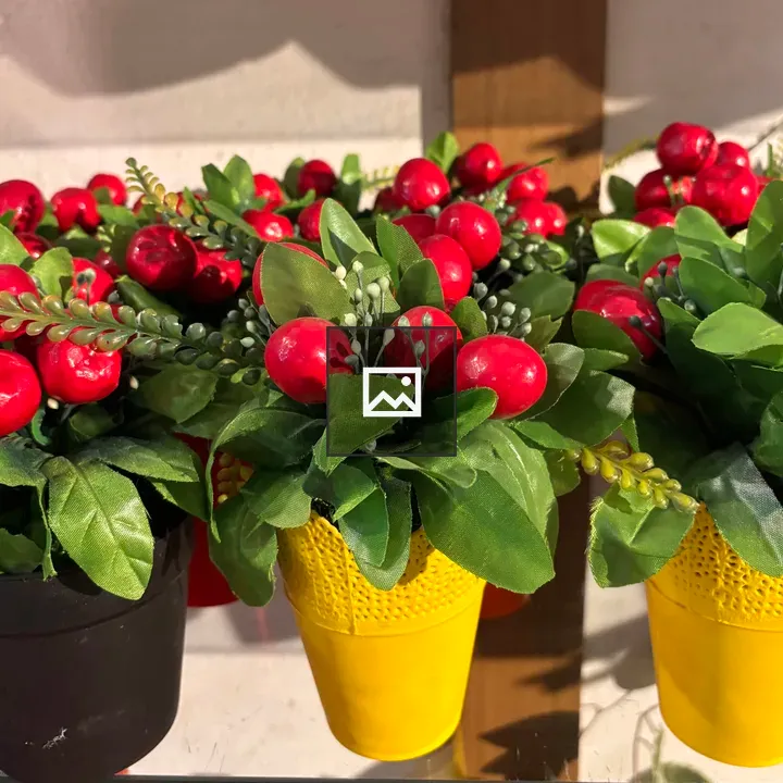 Artificial plant display with berries